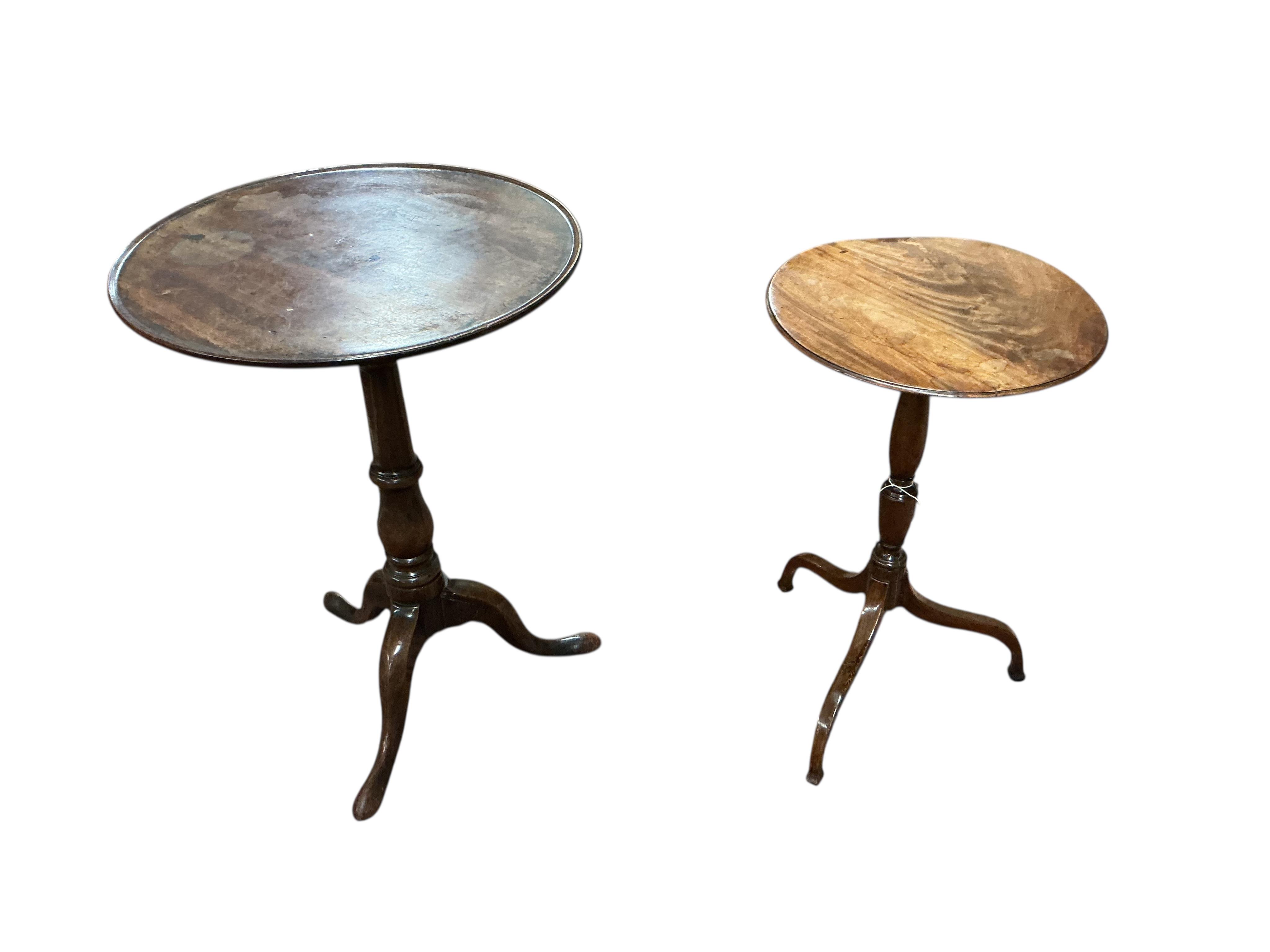 Two early 19th century circular mahogany tripod wine tables, larger diameter 50cm, height 69cm
